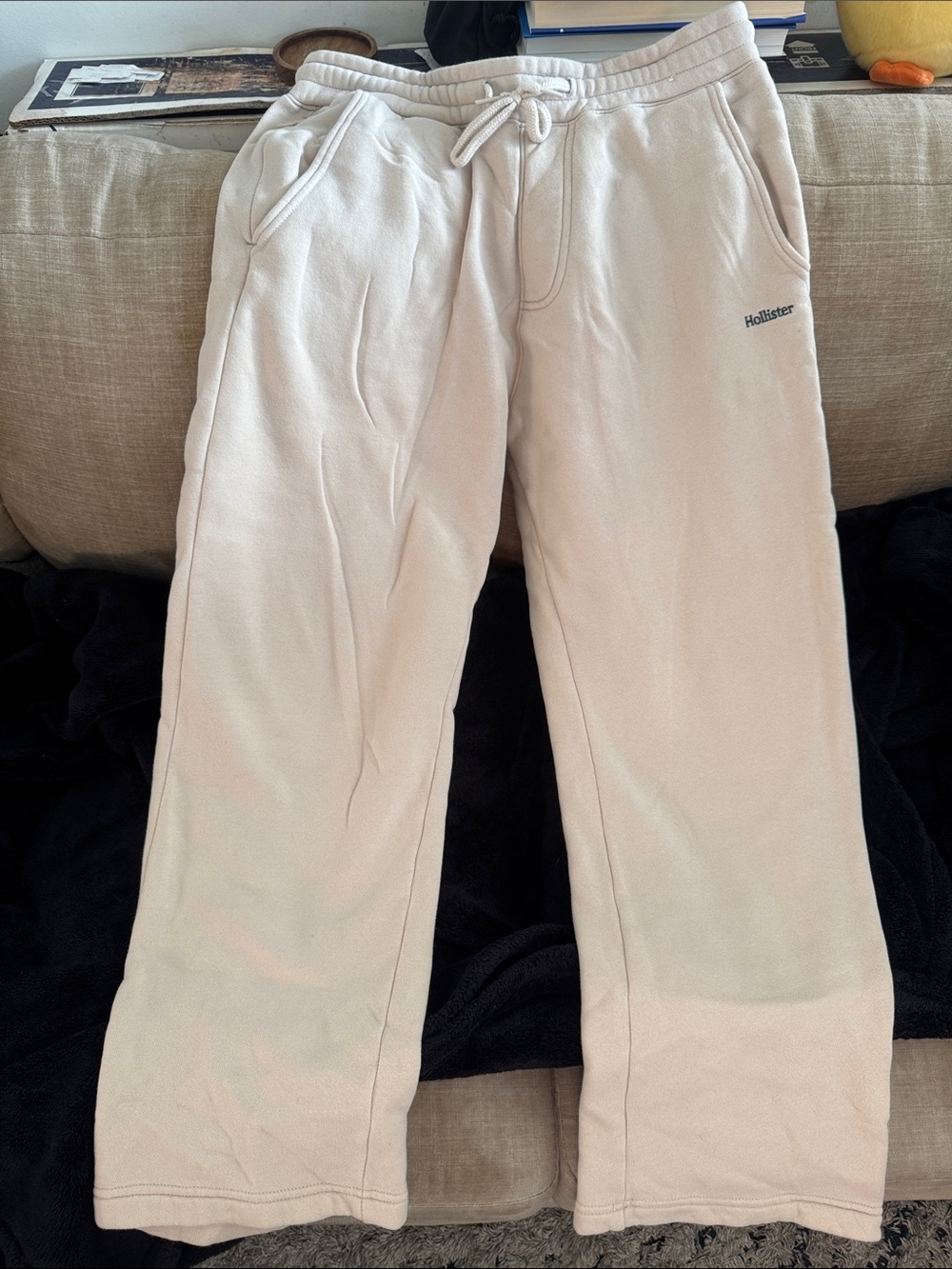 Hollister Men's Cream Drawstring Joggers with zipper pocket